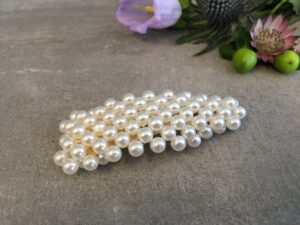 hårspænde med perler tilbud