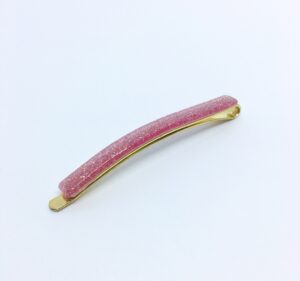 Hårnål fra Winga i en elegant rosa farve med glitter