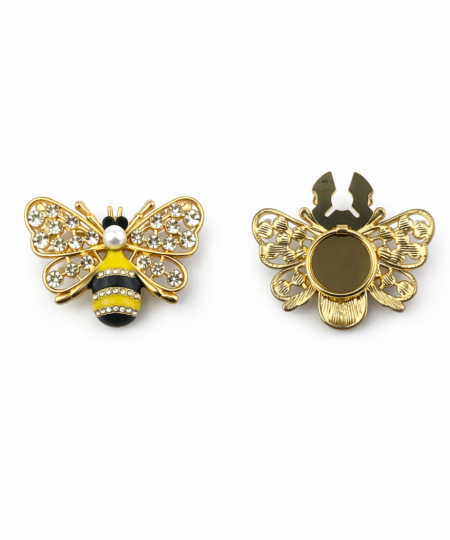 Knappeskjuler Buzz – elegant bi-design Button Cover i gylden finish