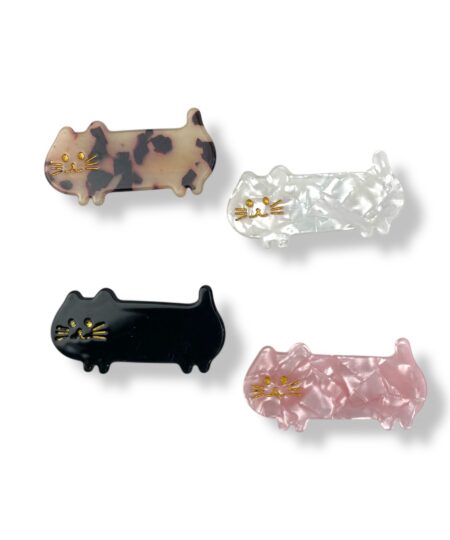 Sød hårklemme formet som en kat i flere farver. Et dekorativt håraccessory der giver din frisure et legende og stilfuldt udtryk.