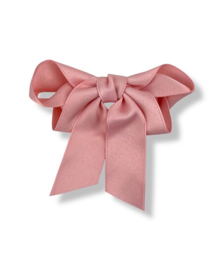 Elegant hårklemme med sløjfe i pink, sort og creme. Et stilfuldt håraccessory der passer perfekt til både hverdag og fest.