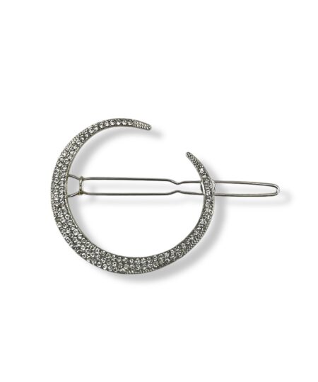 Elegant rundt hårspænde med funklende sten. Et stilfuldt håraccessory der giver din frisure et klassisk og feminint udtryk.