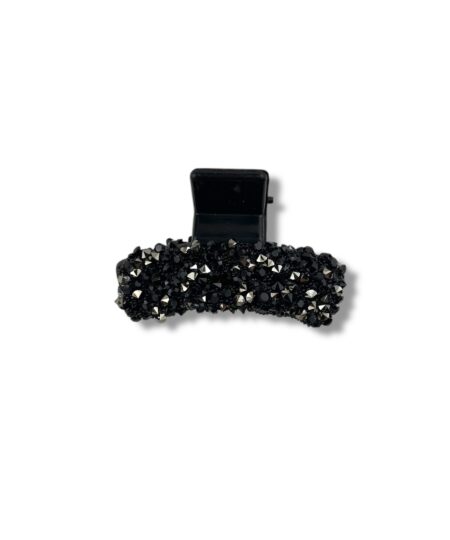 Elegant mini hårklemme med små dekorative sten. Et stilfuldt håraccessory, der giver din frisure et fint og feminint udtryk.