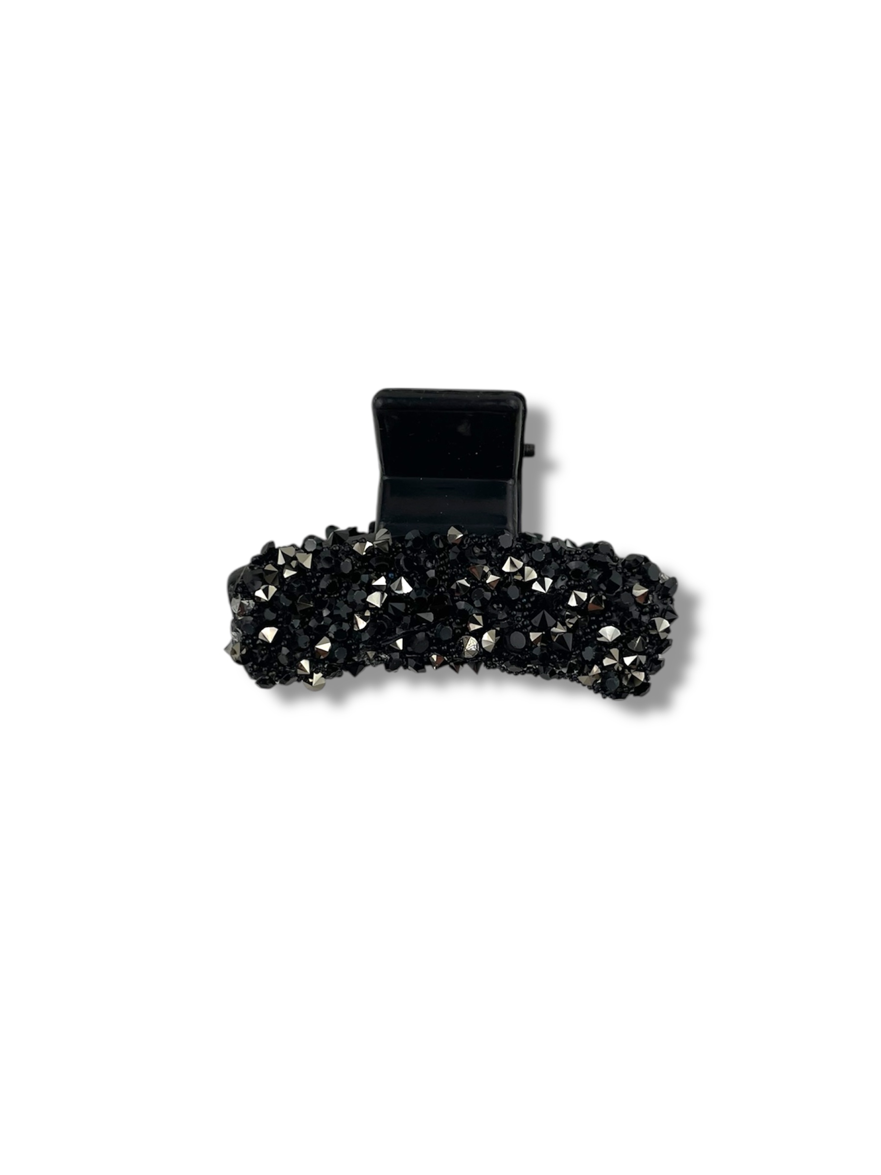 Elegant mini hårklemme med små dekorative sten. Et stilfuldt håraccessory, der giver din frisure et fint og feminint udtryk.
