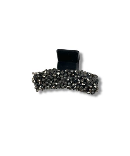 Elegant mini hårklemme med små dekorative sten. Et stilfuldt håraccessory, der giver din frisure et fint og feminint udtryk.