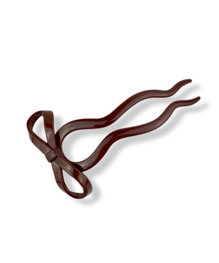 Elegant fransk hårnål med sløjfe. Et feminint håraccessory, der giver din frisure et klassisk og stilfuldt udtryk.