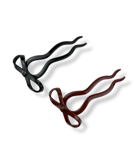 Elegant fransk hårnål med sløjfe der giver din frisure et feminint og stilfuldt udtryk. Perfekt til både hverdag og fest.