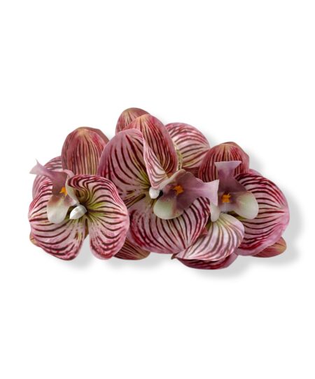 Elegant hårklemme med orkidéblomst, der giver din frisure et feminint og stilfuldt udtryk. Perfekt til både hverdag og fest.
